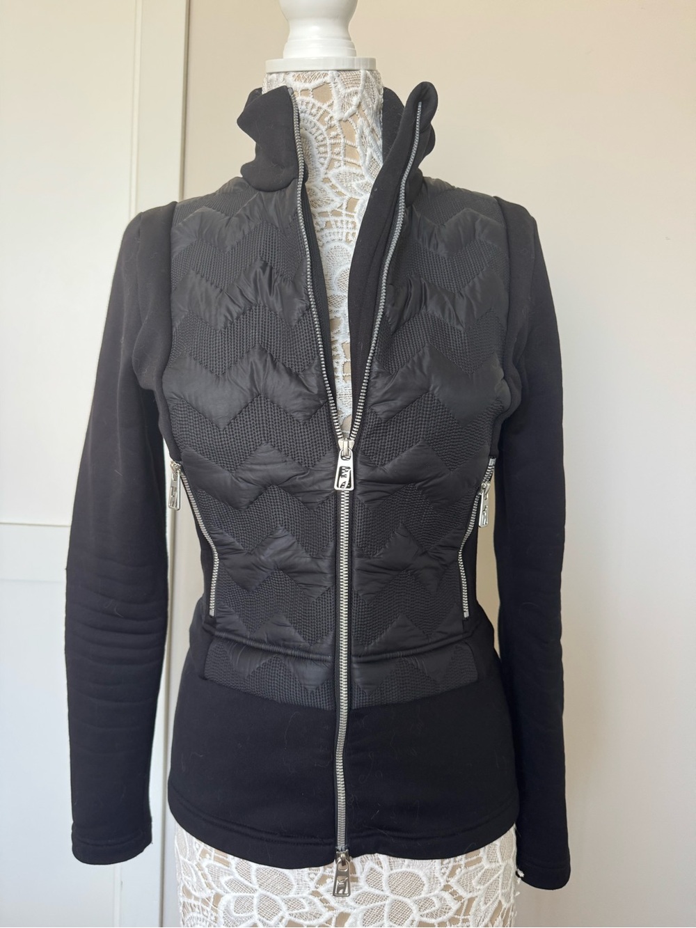 Black Quilted Toni Sailer women's hybrid jacket & mid-layer